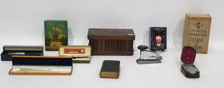 19th century olivewood and inlaid puzzle box decorated with birds, a students microscope, leather