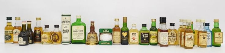 Box of mixed miniature spirits including The Famous Grouse, Bell's, Talisker