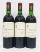 Three bottles 1974 Pauillac, one of the premier wine producing areas of Bordeaux