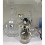 Cut glass with electroplated filter rim, four various decanters and stoppers and an ice bucket, etc