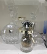 Cut glass with electroplated filter rim, four various decanters and stoppers and an ice bucket, etc