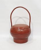 Red lacquer oriental treen rice basket with loop handleCondition Reportoverall condition without