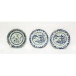 Pair of 19th century Chinese porcelain plates with underglaze blue painted lakeside landscape to the
