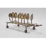 Early Victorian silver toast rack, seven-division, in the form of lilypad leaves and raised on
