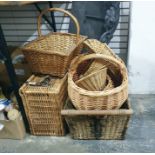 Various baskets including picnic basket, large shopping basket, log basket and three others