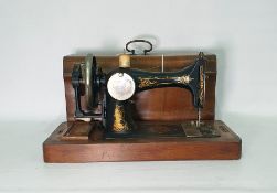 Gilt painted Singer sewing machine in mahogany box