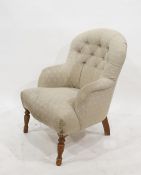 20th century modern armchair in grey ground button back upholstery, turned front legs