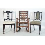 Oak ladderback rush-seated rocking chair and two further chairs (3)