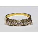18 ct gold and five stone diamond ring Condition Reportthe larger stone is approx 3 mm the rest
