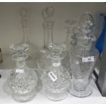 Pair of 19th century hobnail cut decanters and stoppers, another pair of decanters etched with Greek
