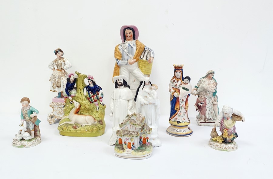 Ten assorted figures of figural groups including pair of Dresden figures of children feeding some