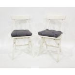 Pair of white painted folding chairs (2)