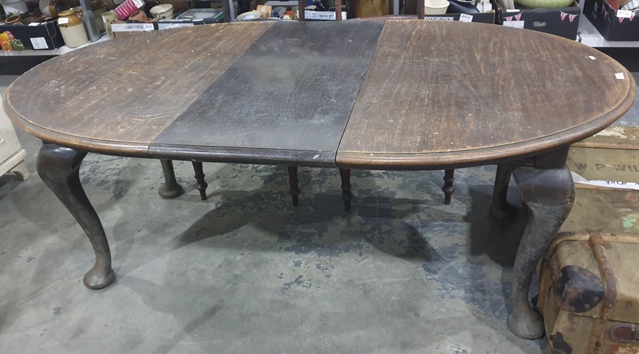 Early 20th century oak D-end extending dining table on cabriole supports
