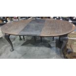 Early 20th century oak D-end extending dining table on cabriole supports