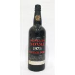 Bottle of Quinta Da Novale 1975 vintage port, label complete but damaged, wax capsule top is