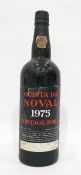 Bottle of Quinta Da Novale 1975 vintage port, label complete but damaged, wax capsule top is