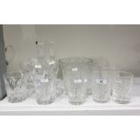 Pair of Royal Doulton cut glass champage flutes, a set of four etched glass wines, a cut glass