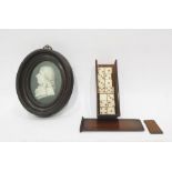 Boxed miniature set of bone dominoes together with an 19th century ivory miniature of gentleman in