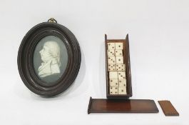 Boxed miniature set of bone dominoes together with an 19th century ivory miniature of gentleman in