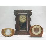 Late 19th/early 20th century American mantel clock in carved Art Deco style oak case, the movement