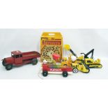 Assortment of toys to include Brio Labyrinth, Tonka toys, xylophone, pull along duck, tip up truck