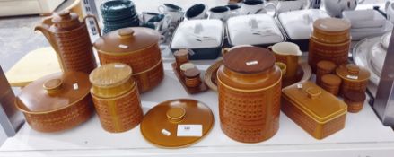 Quantity of Hornsea pottery in the Saffron pattern including storage jars, butter dish, coffee pot