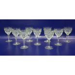 Set of nine William Yeoward cut glass goblets each with ovoid bowl having relief diamond band