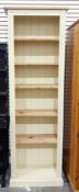 Cream painted narrow bookcase with adjustable shelves, plinth base (height 198 cm X width 66 cm X