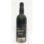 Bottle of Crofts 1960 vintage port, label complete but wax capsule top is missing