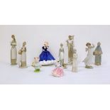 Collection of ten various porcelain figurines to include a Lladro figure of boy holding goat, a