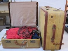 Large canvas and leather suitcase with a smaller matching made by Victor Luggage, the smaller case