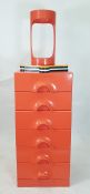 20th century Schonbuch Furniture six-drawer chest in orange, an umbrella stand and four coat hangers