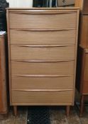 20th century teak chest of six drawers, on turned tapering supports, 67cm x 112cm