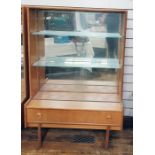 Pair of 20th century Turnidge teak lounge display cabinets, the two sliding glass doors enclosing