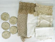 Quantity of table linen including tablecloths, mats, lace and crochet trimmings and a bag of an