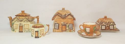 Various items of cottageware to include teapot, butter dish, cream jug, lidded pot, teacup and