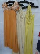 1970's peach chiffon evening dress with clear sequin detail to the bodice, scoop back with bow and