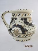 Charlotte Rhead Pottery Mug, Tudor Rose pattern in black and gold with moulded neck and tapering