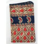 Large machine embroidered Indian-style wall-hanging, red and gold on a blue wool ground