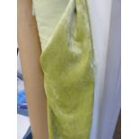 Two good lengths of lime green velvet furnishing material on two rolls