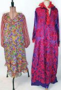 Heavily embroidered kaftan style full-length dress, red on dark purple satin with red and purple