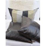 Pair of eelskin brown leather cushions labelled 'AHB', a large silk-covered cushion and a 1970's