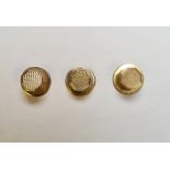 Three various gold studs, in case