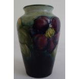 Moorcroft pottery vase, shouldered and tapering, blue/green ground painted and tube-lined with