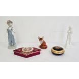 Royal Doulton model of a fox, a Lladro figure of a boy wearing a cap and dressed in blue