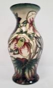 Moorcroft pottery inverse-baluster vase, cream ground with slip trail floral decoration, 19cm high