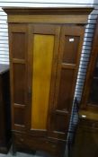 Early 20th century single door oak wardrobe with drawer under, on stile supports, 193cm x 81.5cm