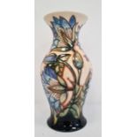 Moorcroft vase, baluster shape, cream ground with blue flowers with green leaves, limited edition