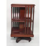 Late 19th/early 20th century mahogany and satinwood banded rotating library bookcaseCondition