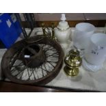 Cast iron vintage cart/car wheel, a pair of brass table lamps, a pair of glass table lamps, a